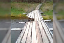 Фото - Россияне разобрали мост на костры