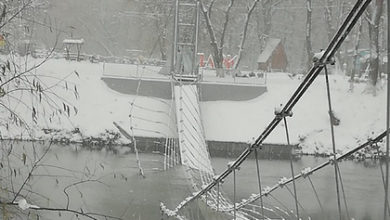Фото - Недавно отремонтированный мост ушел под воду из-за снега